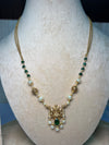 Golden and green Lakshmi pendant set