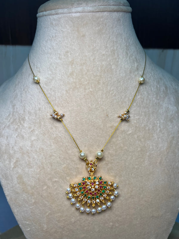 Transparent golden chain with multicoloured locket