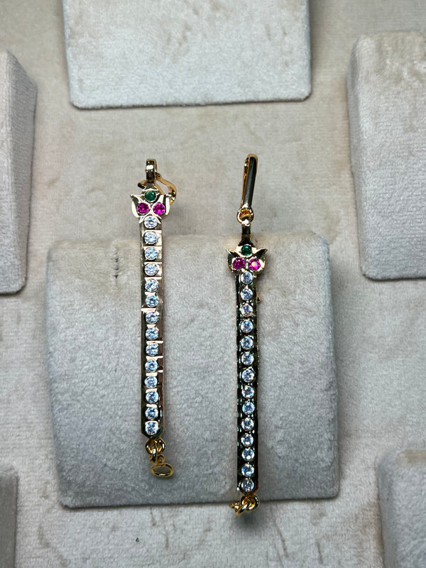 Viral golden Ear Maati with white stone