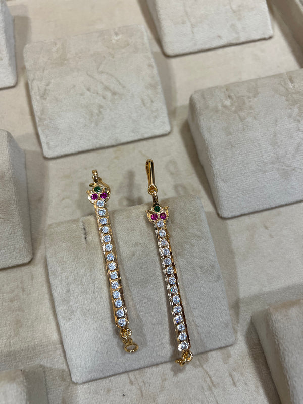 Viral golden Ear Maati with white stone
